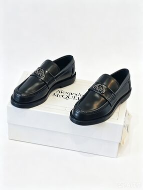 Alexander McQueen black leather loafers i